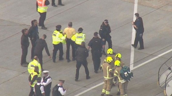 Extinction Rebellion protester climbs on plane at London City Airport
Extinction Rebellion protester climbs on plane at London City Airport