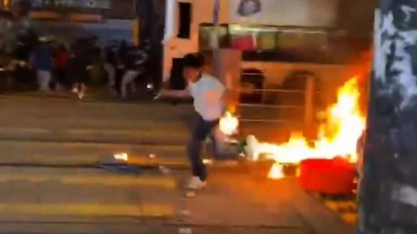 
                              Hong Kong: Violence flares again as pro-democracy protesters defy mask ban 
                      