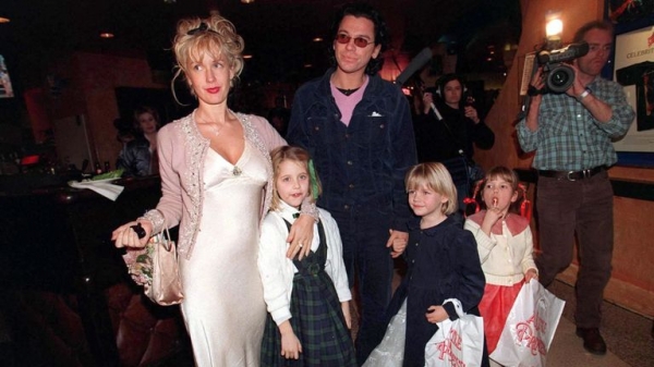 
                              INXS star Michael Hutchence and the secret he took to his grave
                      